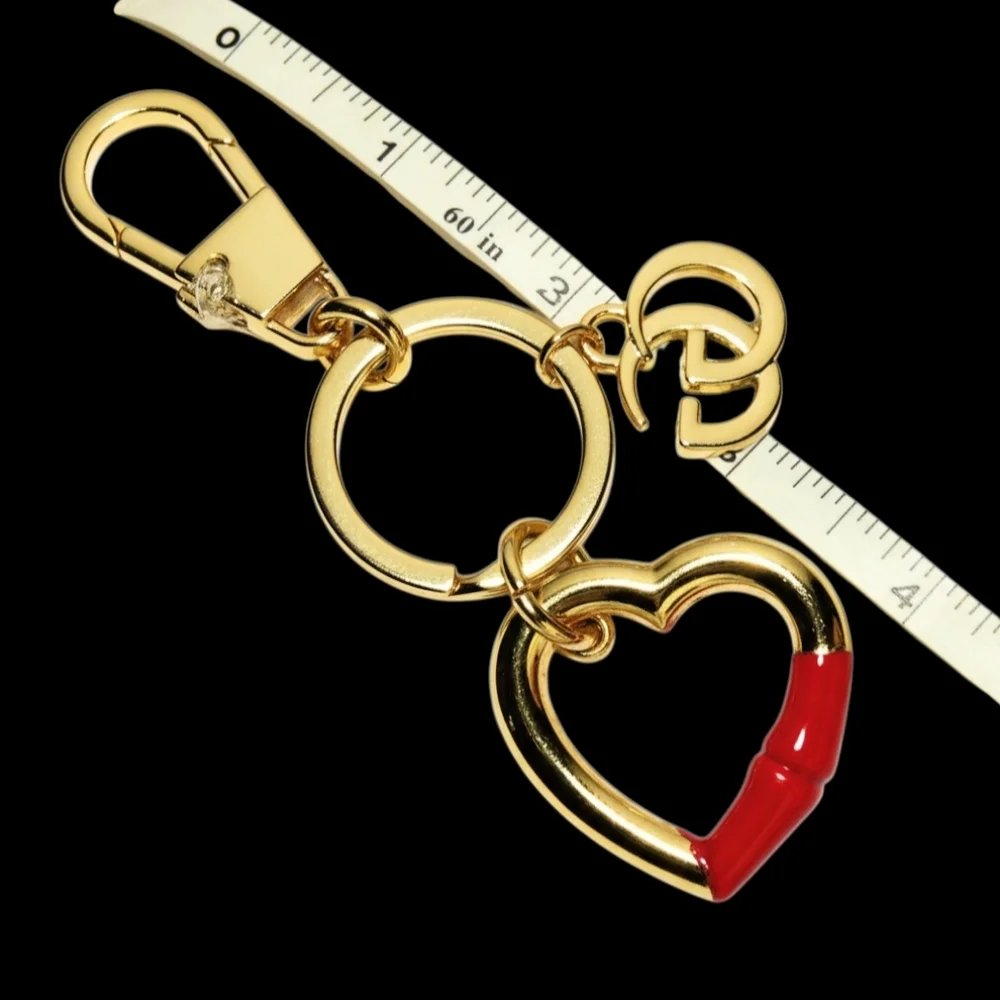 Heart-shaped keychain with red enamel